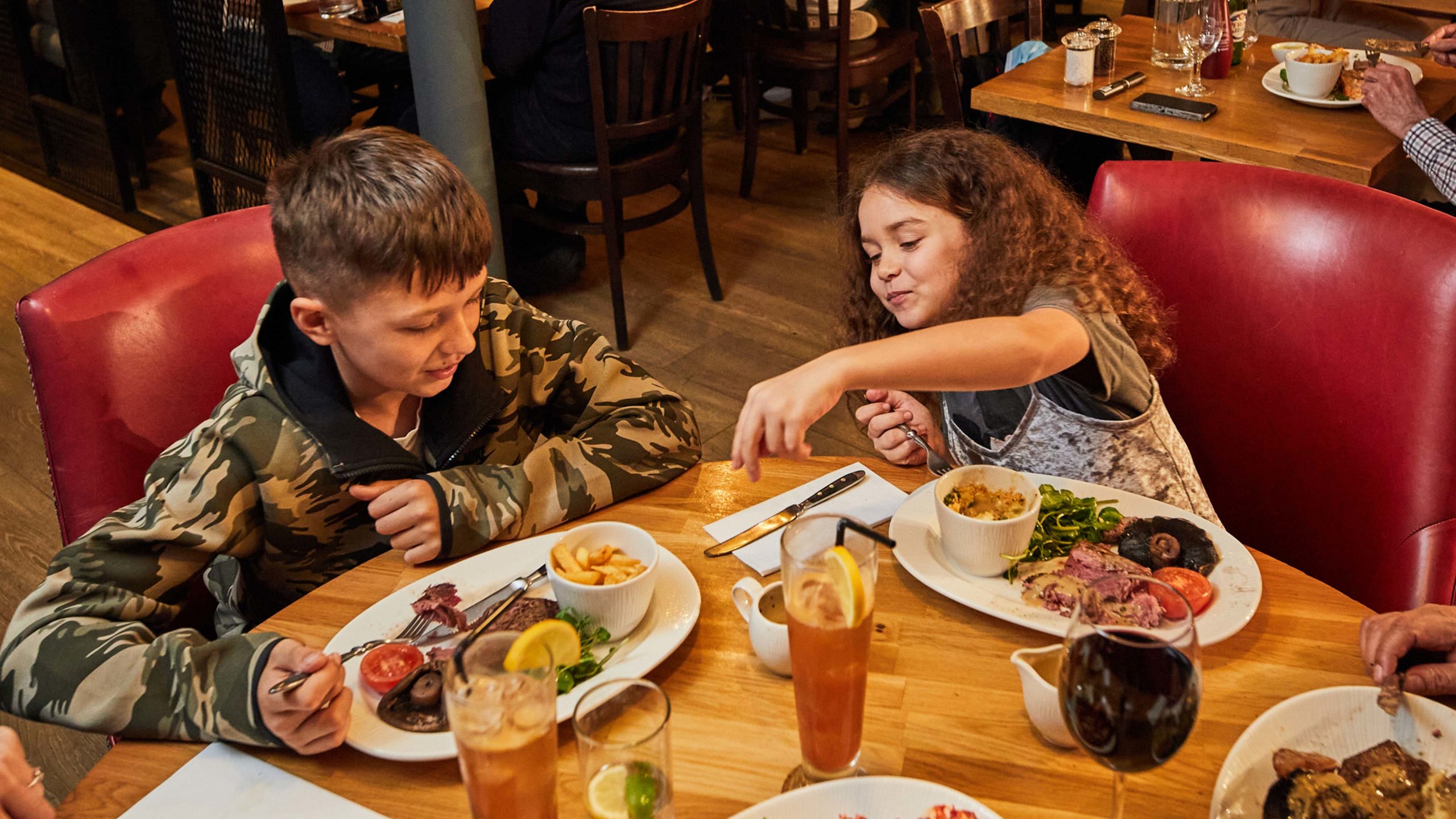 Kids are enjoying their meal in Middletons.